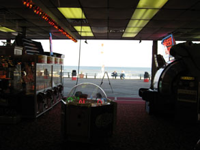 a view of the ocean from an arcade